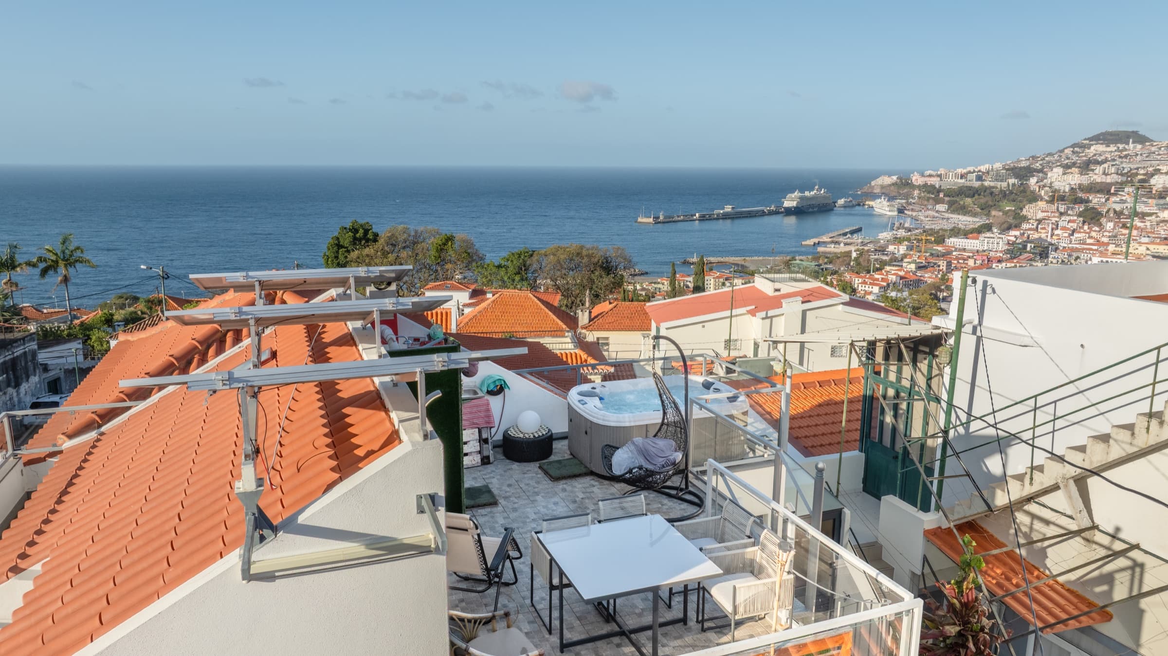 Aerial view of the terrace with jacuzzi, overlooking Funchal Bay and the cruise port