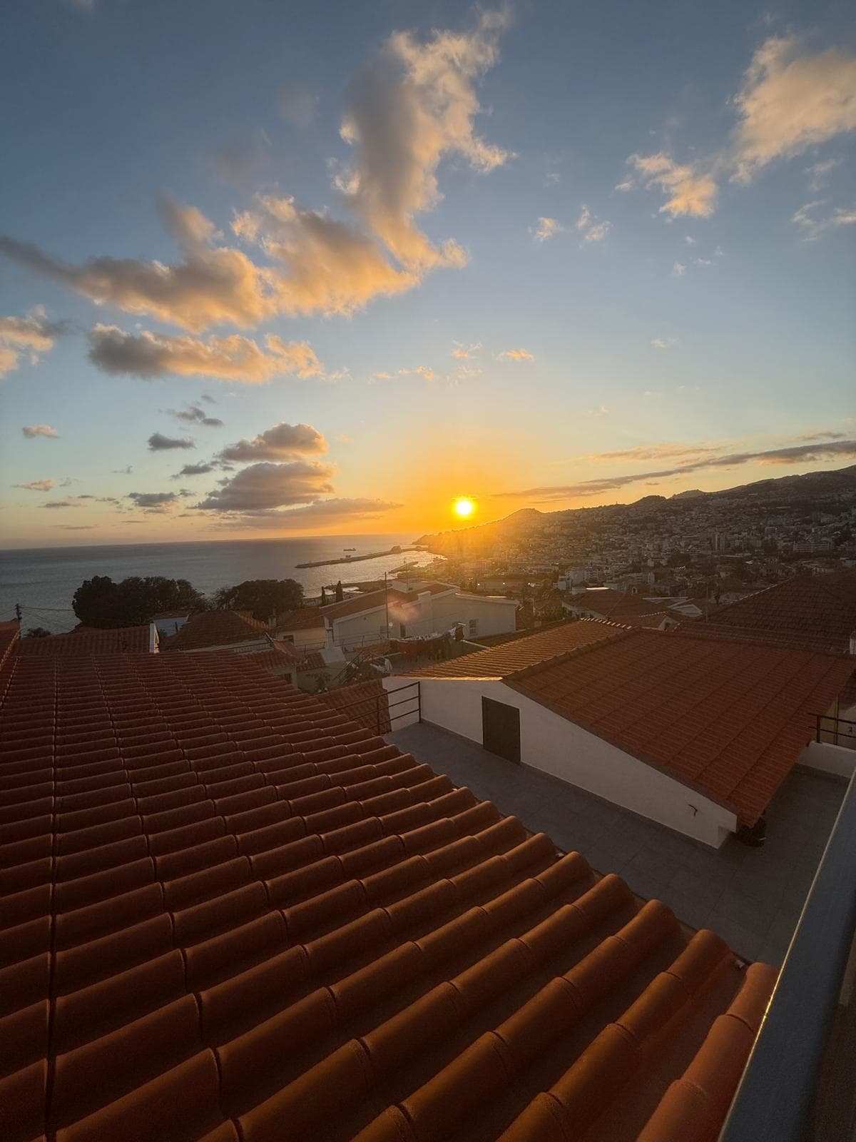 Sunset over Funchal Bay seen from the house