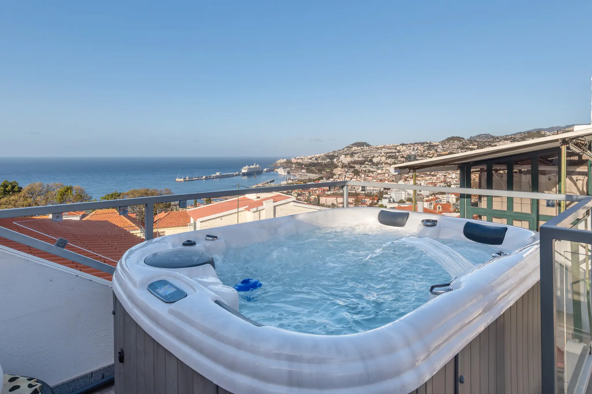 Private jacuzzi on the terrace overlooking Funchal Bay and the cruise port
